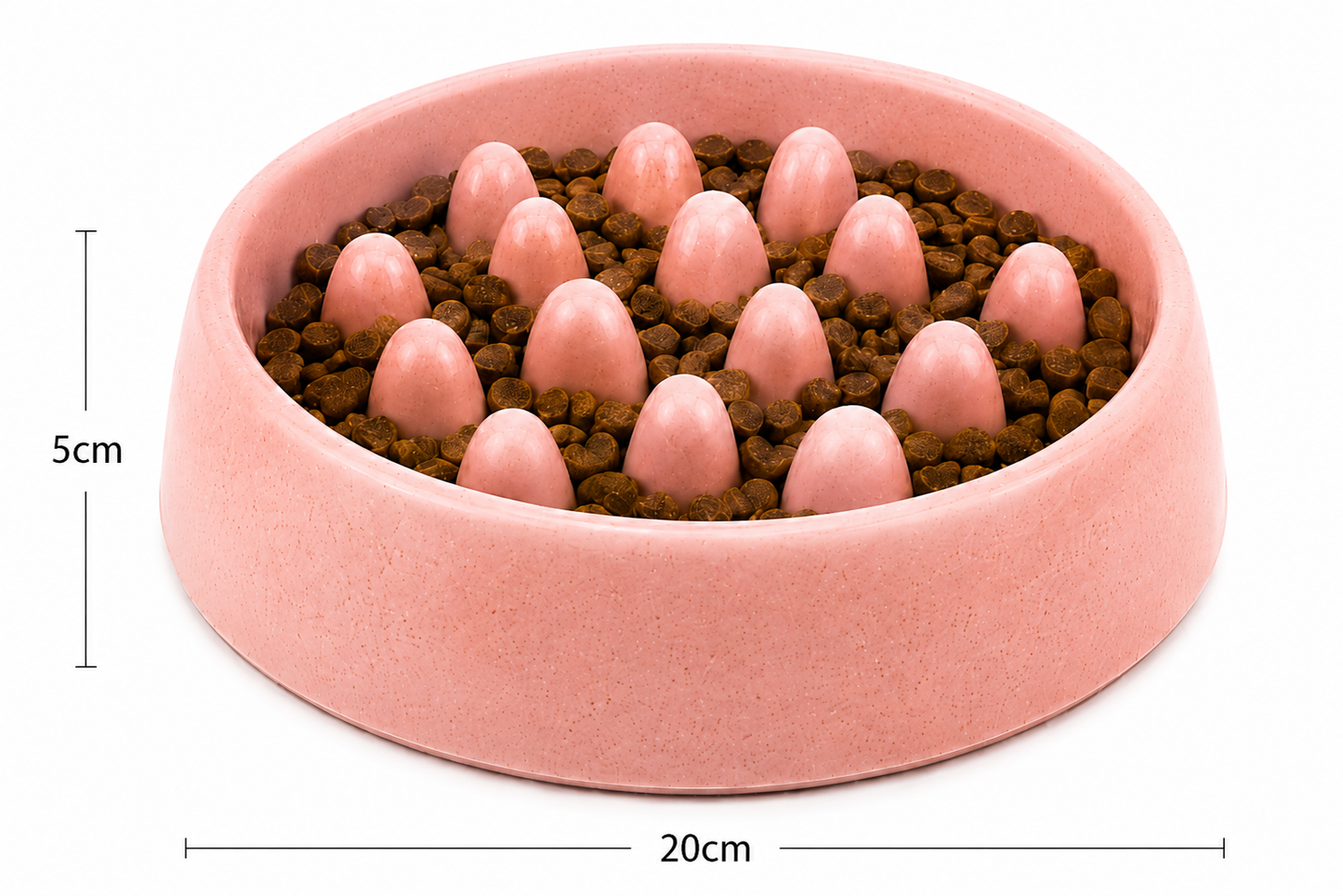 Pink dog bowl filled with kibble and treats, measuring 20cm in diameter