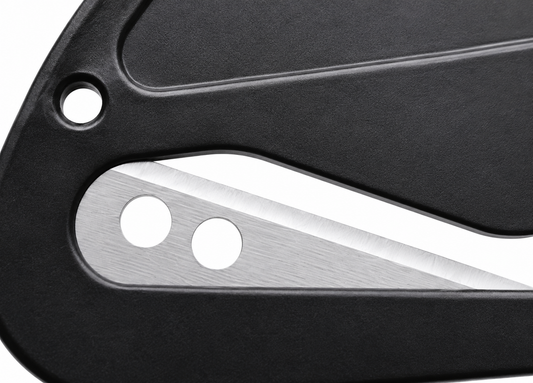 Close-up of a sleek black panel with a silver metallic inlay and two circular