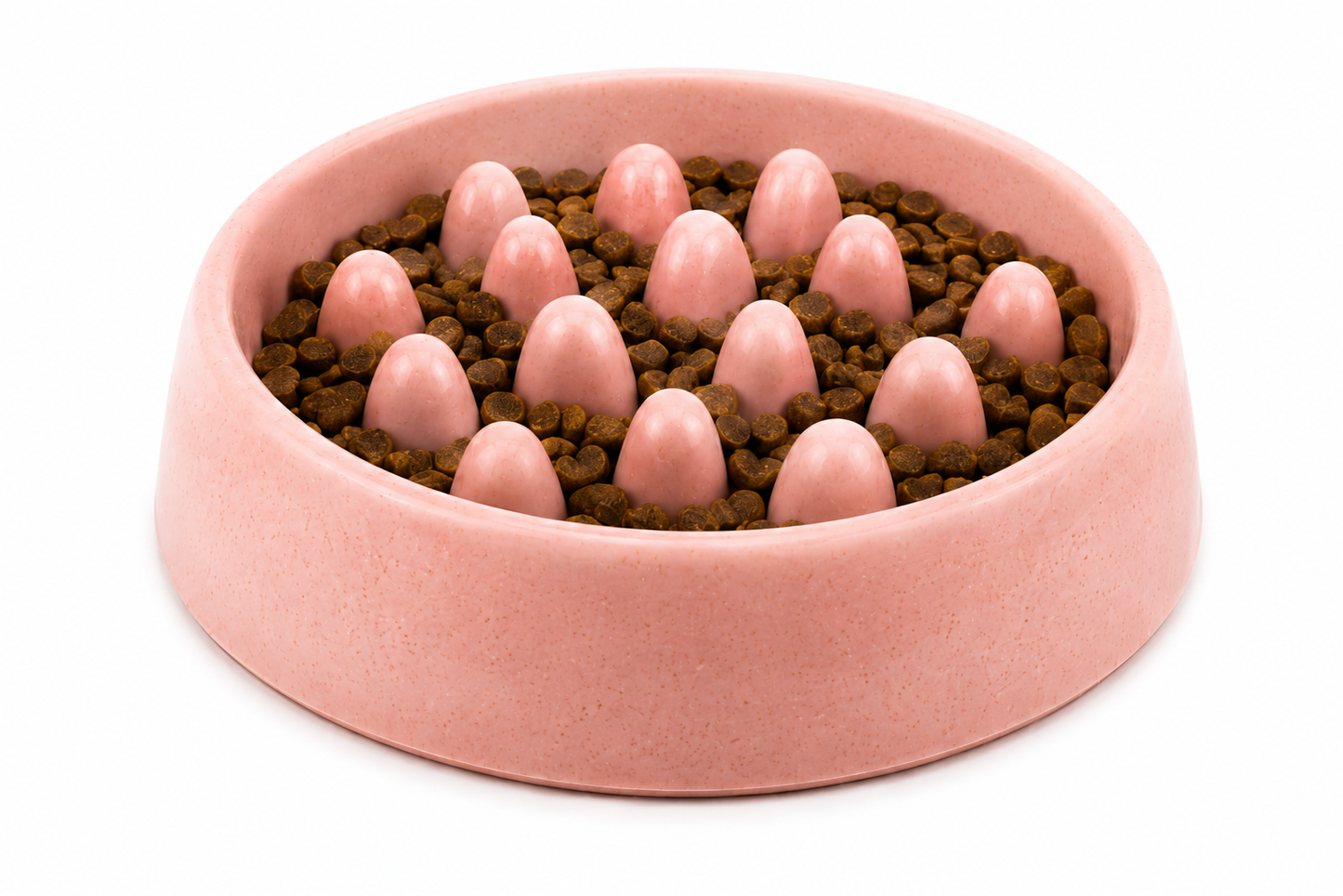 Pink dog bowl filled with brown kibble and pink rubber feeding spikes