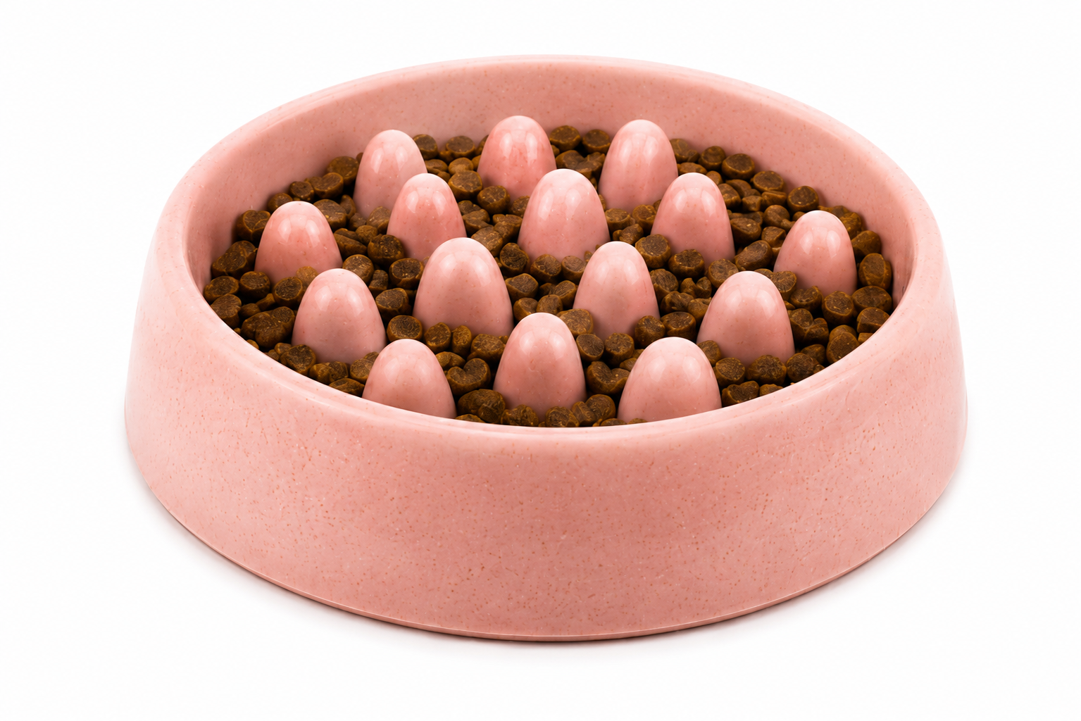 Pink dog bowl filled with brown kibble and pink rubber feeding spikes