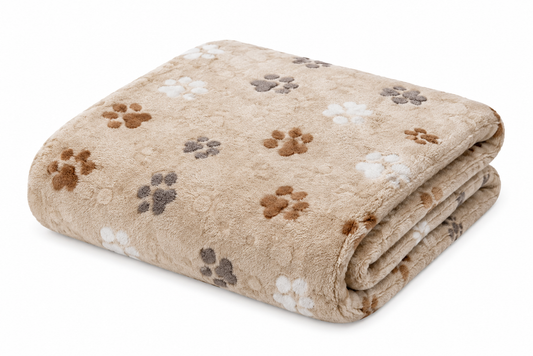 Beige blanket with folded edge featuring paw print pattern in various shades