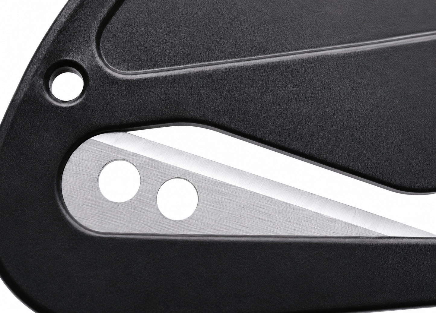 Close-up of a sleek black panel with a silver metallic inlay and two circular